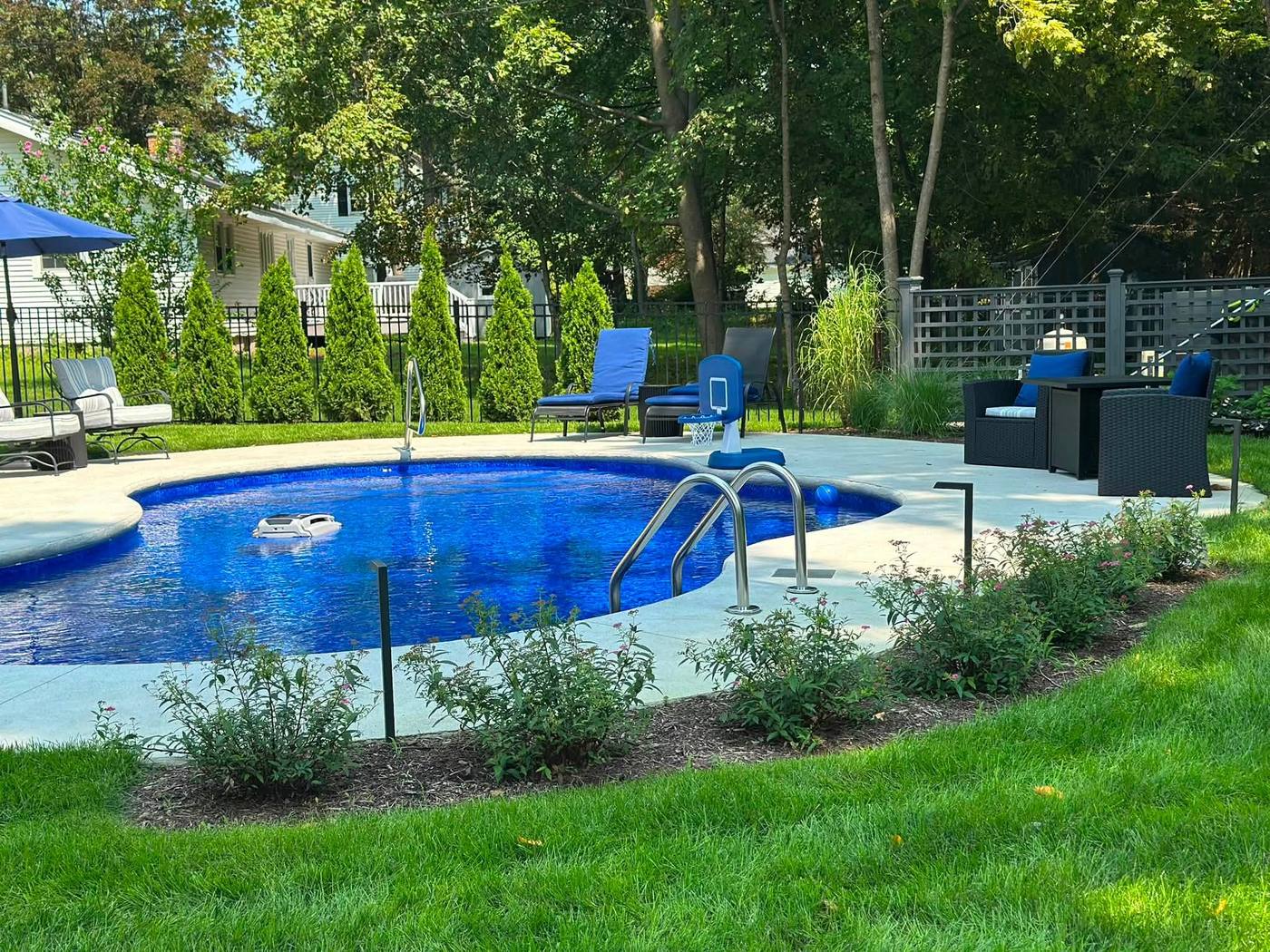 Completed inground pool built by Tri-City Pools